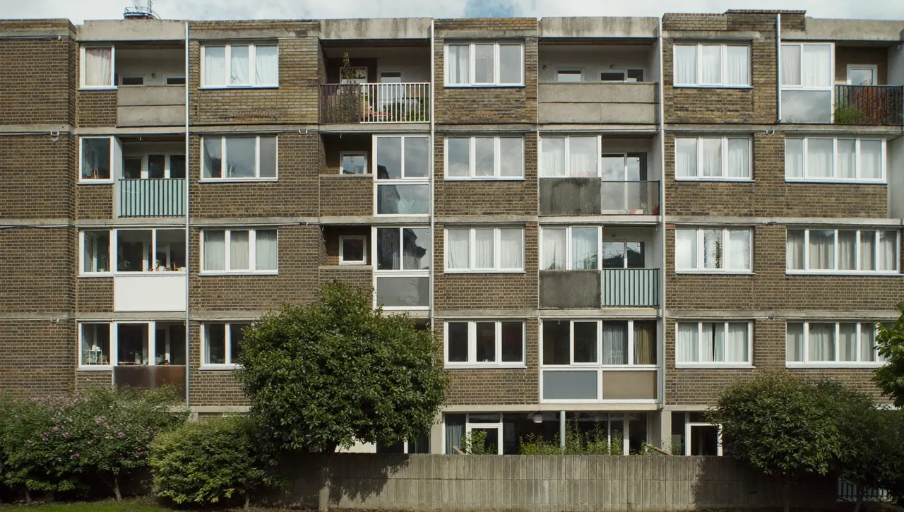 Windows across the front of a residential block of flats